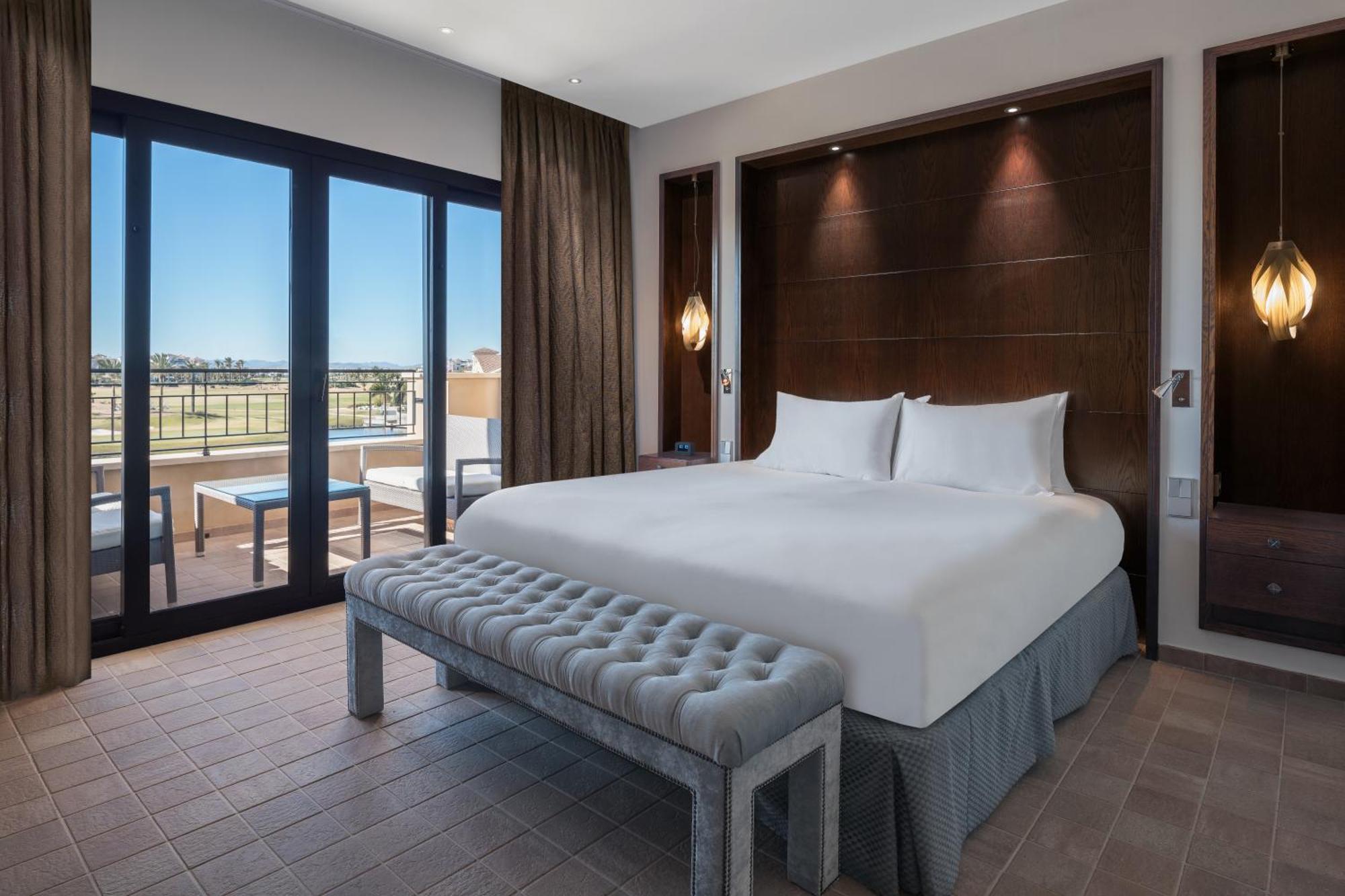 Doubletree By Hilton La Torre Golf Resort Roldan Екстер'єр фото A bedroom at the hotel