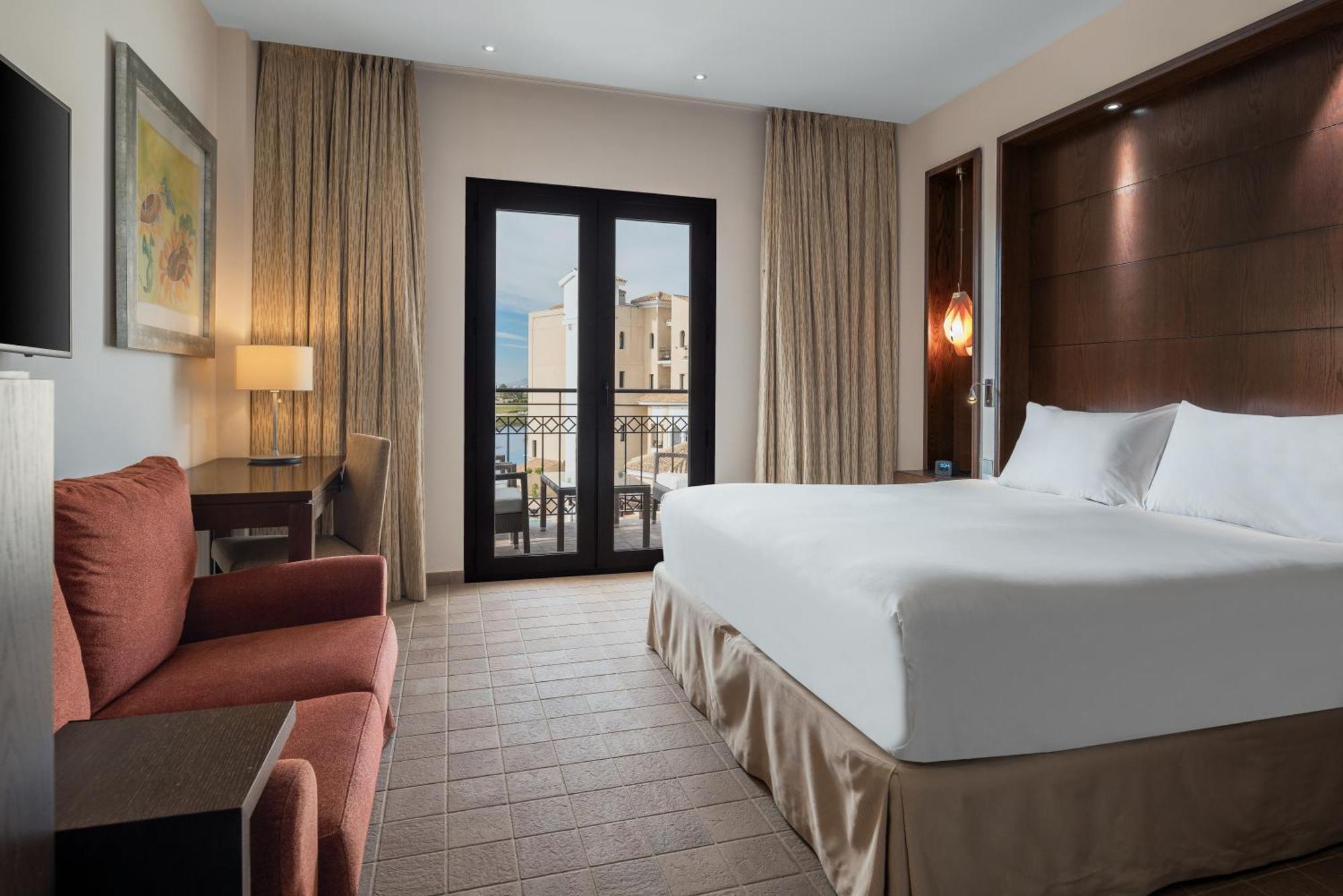 Doubletree By Hilton La Torre Golf Resort Roldan Екстер'єр фото A room at the Hilton Nicosia
